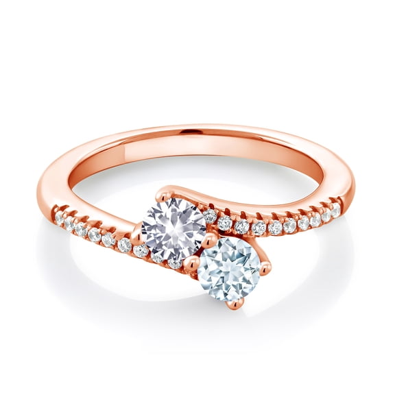Gem Stone King 18K Rose Gold Plated Silver White Created Sapphire and Sky Blue Aquamarine Bypass Ring for Women (0.74 Cttw, Gemstone September Birthstone, Round 4MM, Size 7)