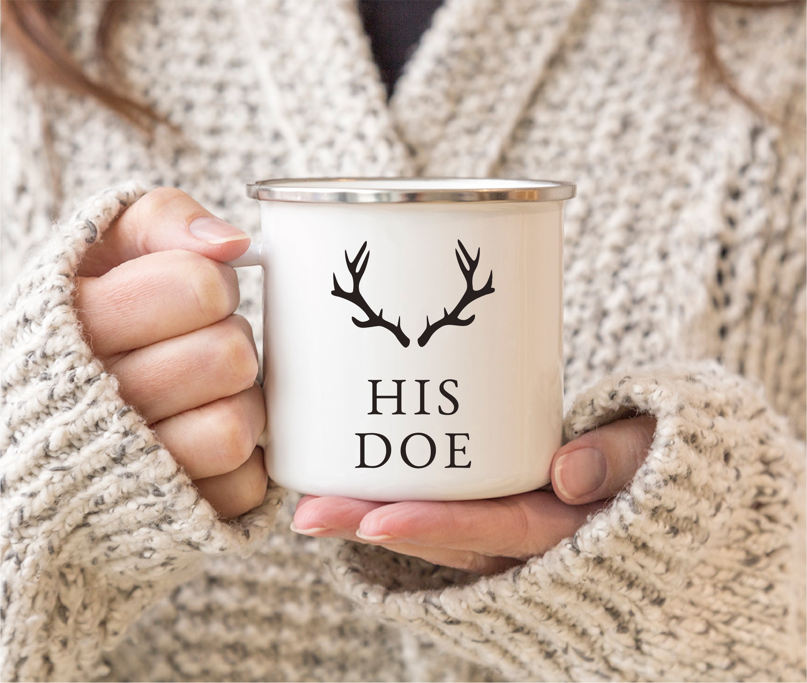 These coffee mugs have a unique design featuring the words "His Doe" and "Her Buck" along with a deer antlers graphic that adds an appealing touch. The design is double-sided, so couples can enjoy the artwork no matter which way they're holding their mug.