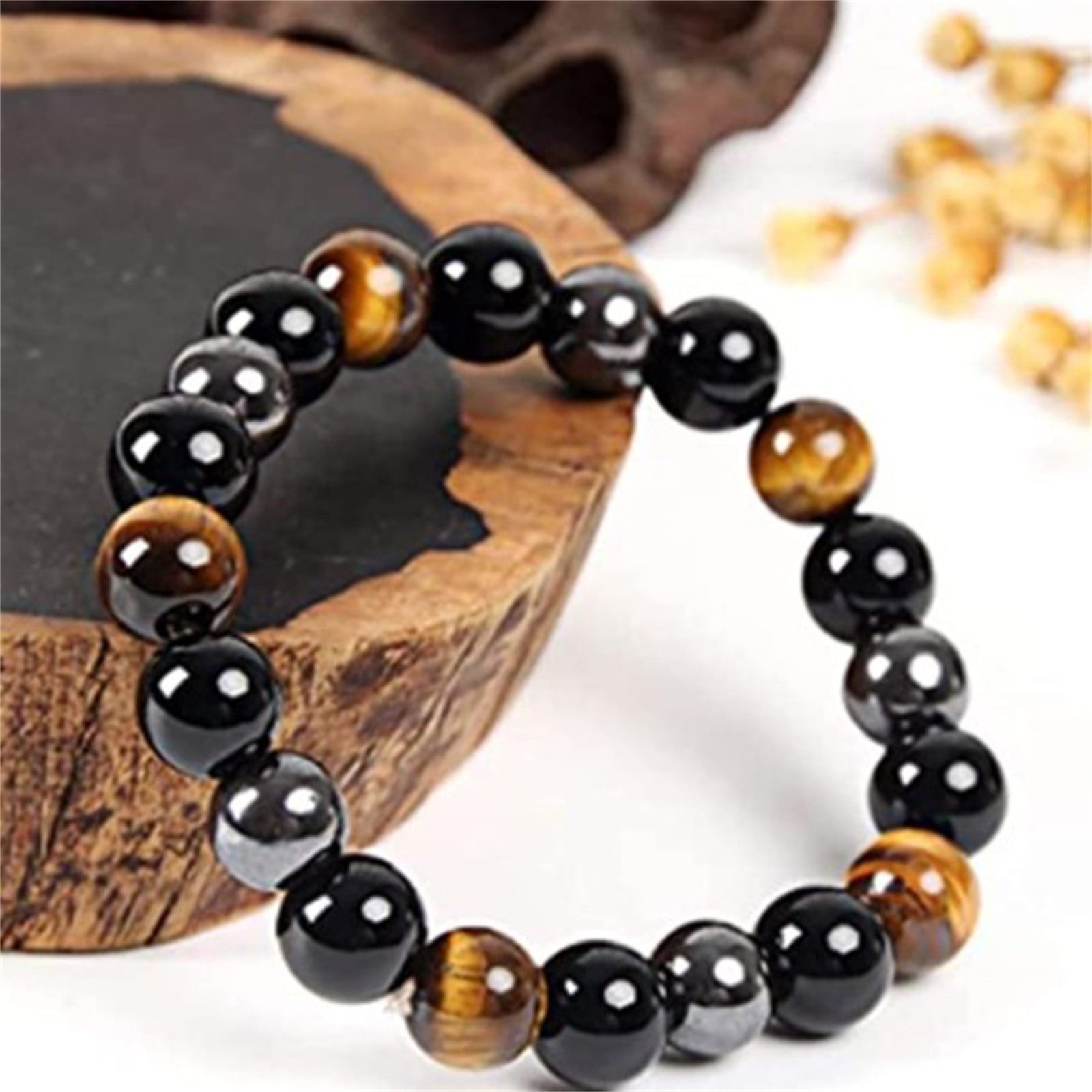янтарь и тигровый глаз браслет. тигровый глаз для женщин. камни яшма тигровый- соколиный глаз. тигровый глаз бусины. тигровый кошачий бычий глаз камень.