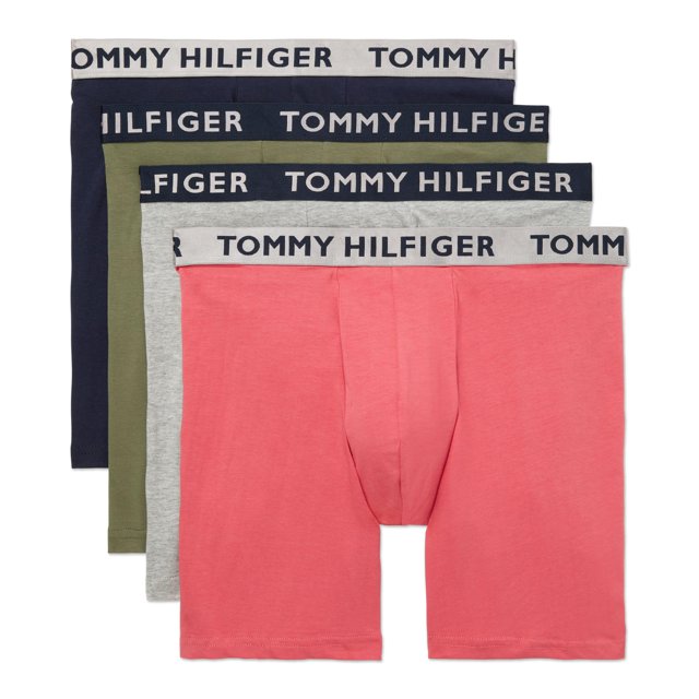 calzoncillos tipo bóxer tommy hilfiger de algodón elástico para hombre, paquete de 4 con tiro medio y pierna larga; conjunto apilado en rosa, gris jaspeado, verde oliva con trébol y azul marino; cintura elástica con logo Tommy Hilfiger repetido en banda contrastante, tejido liso y costuras visibles.
