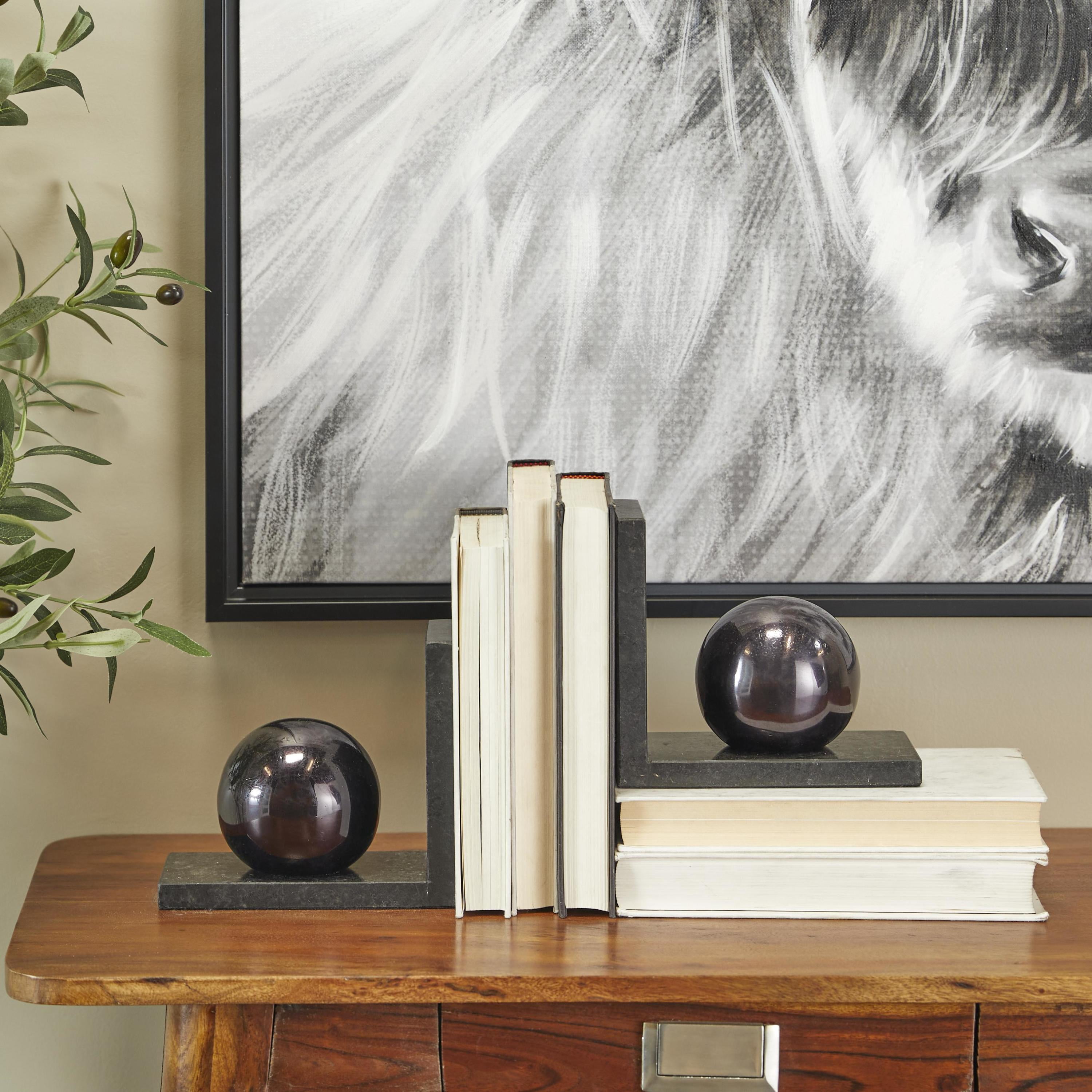 CosmoLiving by Cosmopolitan 7" Orb 7 lbs Black Marble Bookends (Set of 2)