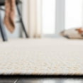 thumbnail image 6 of SAFAVIEH Braided Rishika Solid Machine Washable Reversible Area Rug, Ivory/Beige, 9' x 12' Oval, 6 of 6