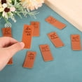 thumbnail image 3 of Uxcell 50 Pack Handmade Leather Labels, Handmade Tags Button 50x20mm, Sewing Machine, 3 of 5