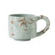thumbnail image 1 of Taza de café de cerámica hecha a mano con estampado de hojas de bambú en relieve, 290 ml, textura rústica, apta para microondas, apilable, regalo para amantes del café., 1 of 8