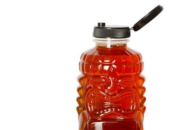 Hawaiian Rainbow Bees Macadamia Nut Flavor Honey in a Tiki Bottle (24oz)