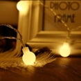 thumbnail image 4 of Battery String Lights, 33ft/10m 100 LED Bulb Warm White Battery Operated Globe String Lights with Remote Controller, Decorative Timer Fairy Light for Christmas/Wedding/Party Indoor and Outdoor, 4 of 5