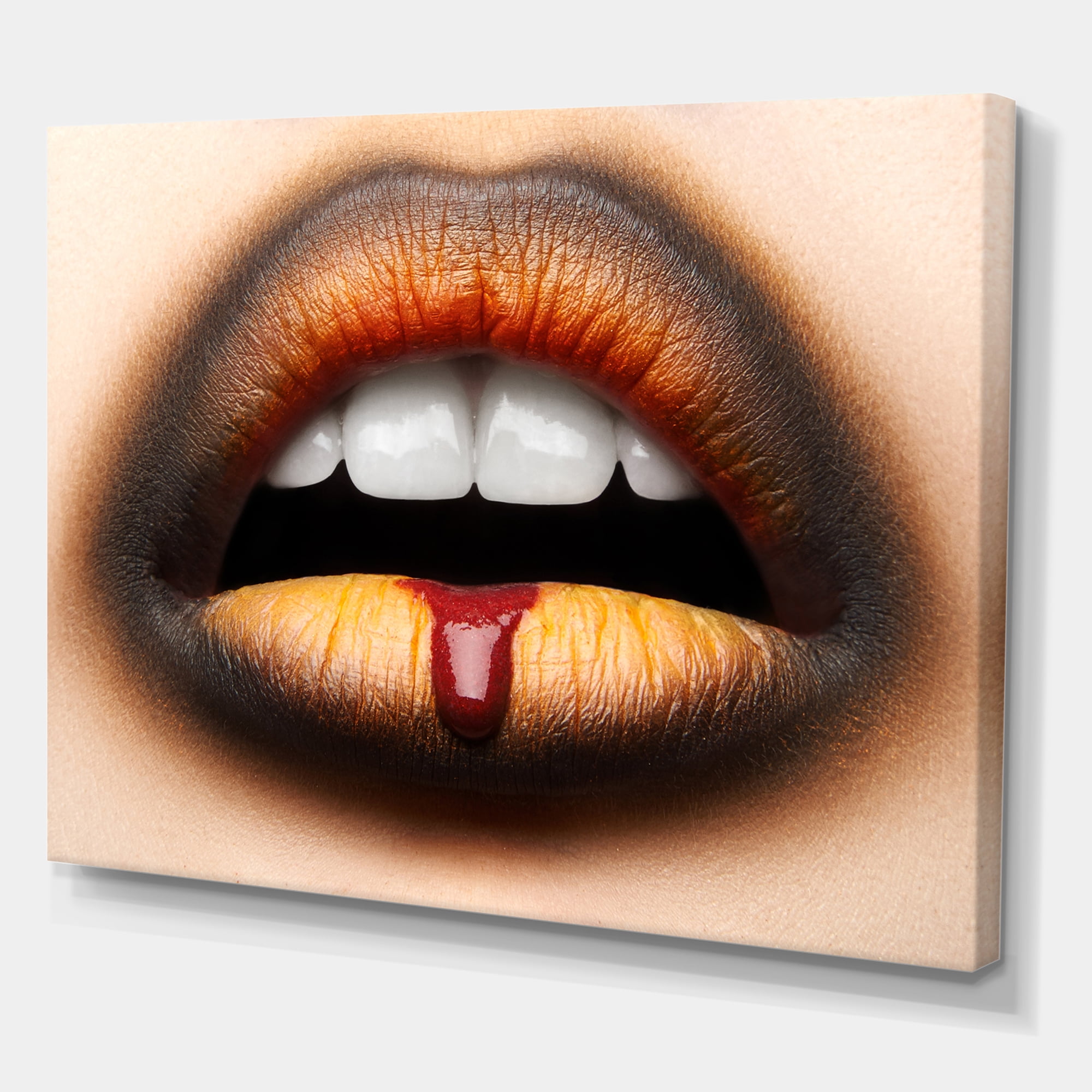 Woman Lips With Black & Orange Lipstick 12 in x 8 in Photography Canvas Art Print, by Designart