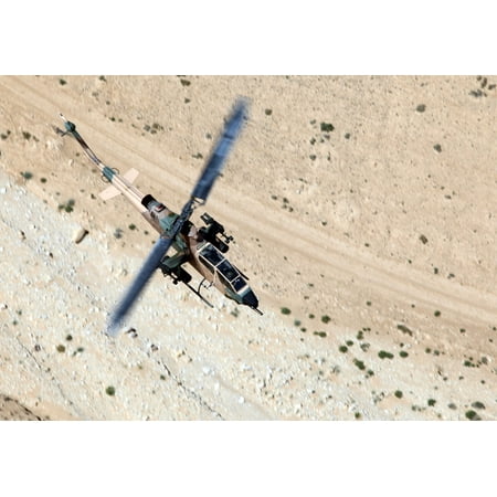 Canvas Print JORDAN A Jordanian Air Force AH-1F Cobra helicopter flies above the desert during a bilateral tr Stretched Canvas 10 x