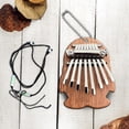 thumbnail image 4 of Fiudx Mini Piano de Pulgar, Ocho Teclas de Acero Al Carbono, Sonido Nítido y Claro, Diseño Portátil, Cordón y Cadena de Metal, Herramienta para Aliviar El Estrés, Regalo para Amantes de La Música, Ta, 4 of 6