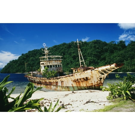 Shipwrecked fishing boat on beach Papua New Guinea Canvas Art - Peter Stone Design Pics (38 x 24)