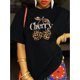 thumbnail image 1 of Women's Casual Cherry Print T-Shirt with Leopard Print Cherries & Letter Design - Short Sleeve, Crew Neck, Polyester Knit Top in Vibrant Orange, Ladies T Shirts, 1 of 5