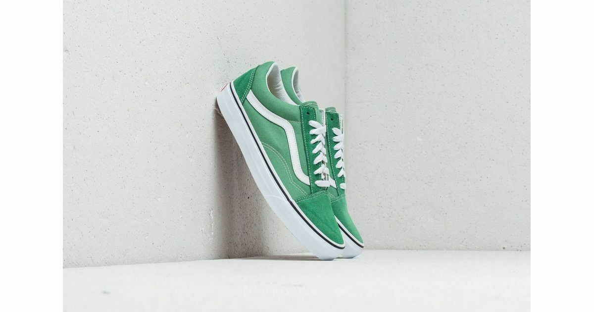 green vans on foot