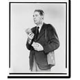 thumbnail image 2 of Historic Framed Print, [Don Hollenbeck, half-length portrait, facing left, modelling new walkie-talkie set], 17-7/8" x 21-7/8", 2 of 9