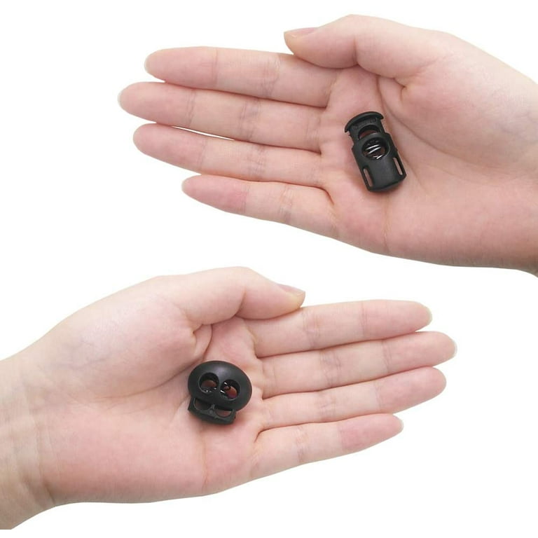 Cord lock, plastic and steel, black, 24 x 13.5 x 15mm flat oval with (2)  holes. Sold per pkg of 10. - Fire Mountain Gems and Beads