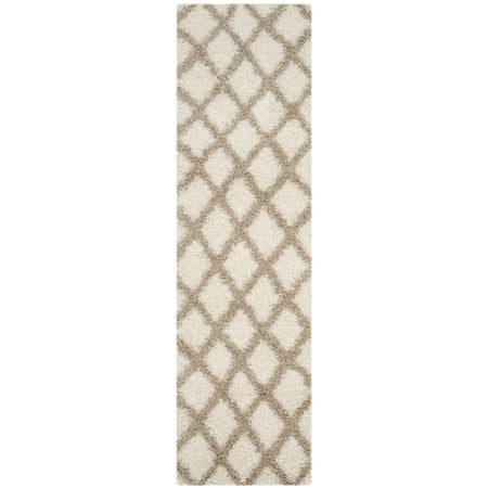 Safavieh SAFAVIEH Dallas Shag SGDS258B Ivory / Beige Rug SAFAVIEH Dallas Shag SGDS258B Ivory / Beige Rug Inspired by classic shag rugs in European homes  SAFAVIEH s Dallas Shag Collection is a stylish transitional floor covering that blends chic modern design with expert construction. Boasting a 2-inch pile height  this rug provides sink-in comfort underfoot while imbuing a sense of sumptuous relaxation. Rug has an approximate thickness of 1.5 inches. For over 100 years  SAFAVIEH has set the standard for finely crafted rugs and home furnishings. From coveted fresh and trendy designs to timeless heirloom-quality pieces  expressing your unique personal style has never been easier. Begin your rug  furniture  lighting  outdoor  and home decor search and discover over 100 000 SAFAVIEH products today.