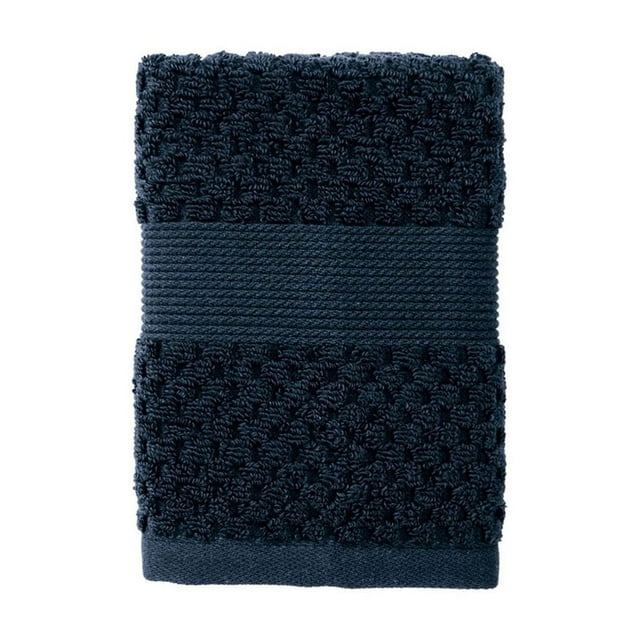 Better Homes & Gardens Signature Soft Popcorn Texture dark blue towel featuring a plush popcorn weave and smooth decorative band.