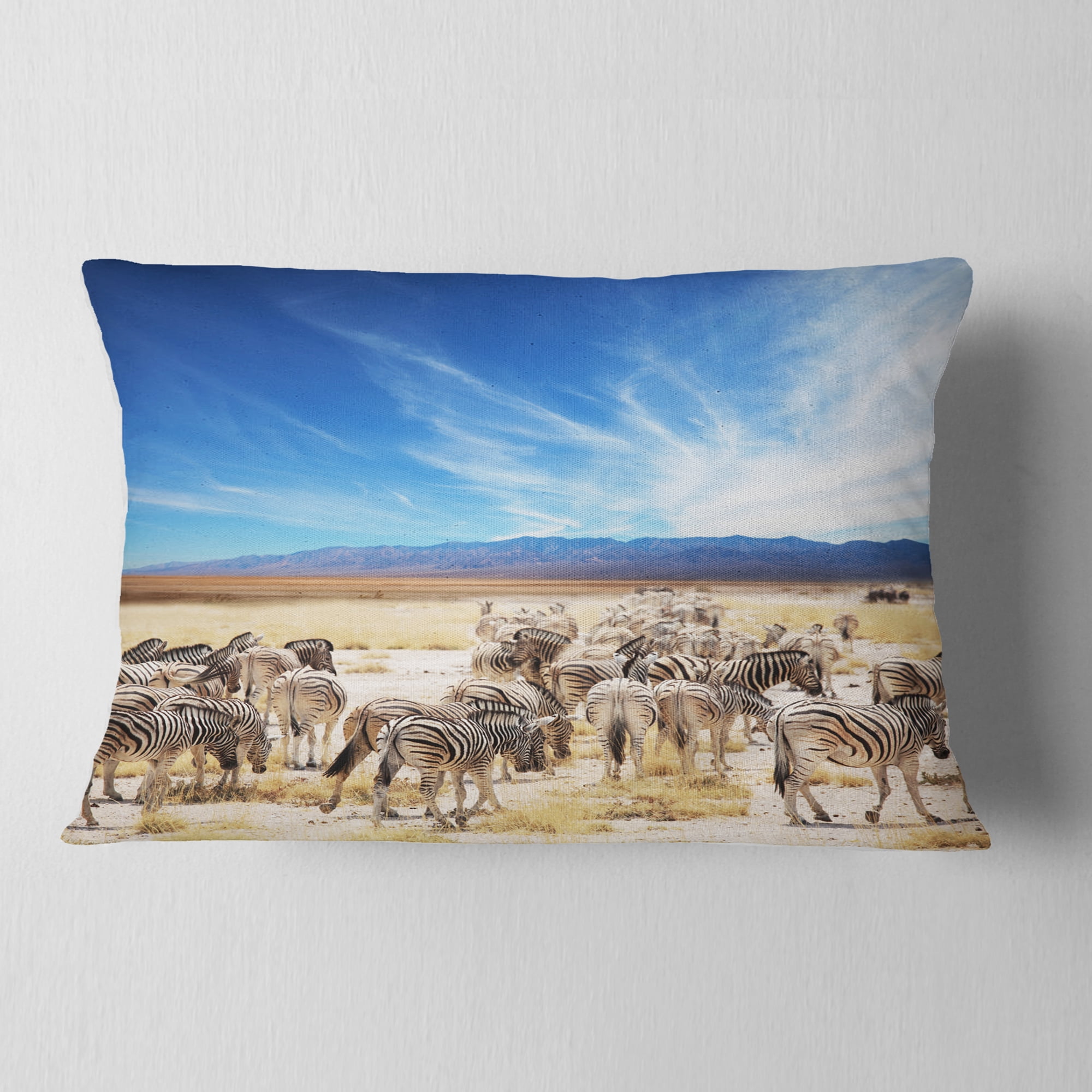 Designart Herd of Zebras under Blue Sky - African Throw Pillow - 12x20