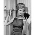 thumbnail image 2 of Close-up of a young woman applying hairspray holding a hand mirror Poster Print (24 x 36), 2 of 4