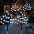 thumbnail image 1 of Luces solares Ohwewant en forma de estaca con forma de copo de nieve, 80 LED, paquete de 4, 1 of 9