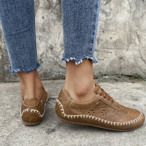 Zapatos planos huecos de banda elástica con punta redonda