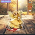 thumbnail image 4 of Rotating acrylic ornament featuring an angelic figure in a pastel yellow dress with iridescent wings holding a golden harp surrounded by ornate bowls, 4 of 6