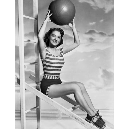 Photo Holding Ball - Virginia Gibson holding a ball Photo Print