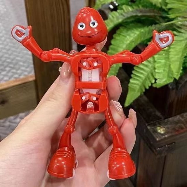 Juguete robot de cuerda popular que baila: divertida figura que salta y se balancea para niños