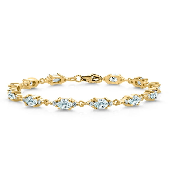 Gem Stone King 18K Yellow Gold Plated Silver Sky Blue Aquamarine and White Moissanite Tennis Bracelet for Women (6.91 Cttw, Gemstone Birthstone, Oval 6X4MM, 7.5 inch)