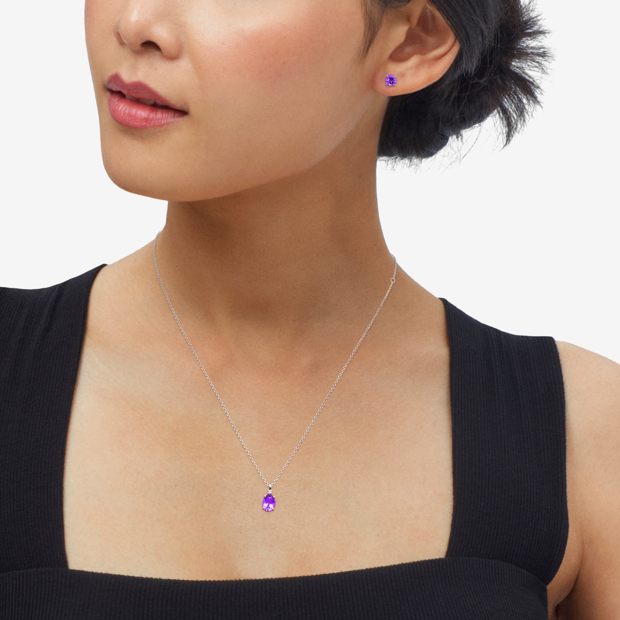 Brilliance Fine Jewelry Oval Simulated Amethyst Pendant and Round Stud Earrings Set in Sterling Silver