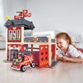thumbnail image 5 of Hape City Red Fire Station Dollhouse Wood Playset, 13 Pieces, Light & Sound, Product Height 18.82 in, Gift Idea for Toddlers & Kids Ages 3+, 5 of 6
