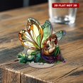 thumbnail image 6 of Revolving acrylic ornament featuring a fairy with butterfly wings in stained glass style vibrant colors on a white background with a clean border, 6 of 8