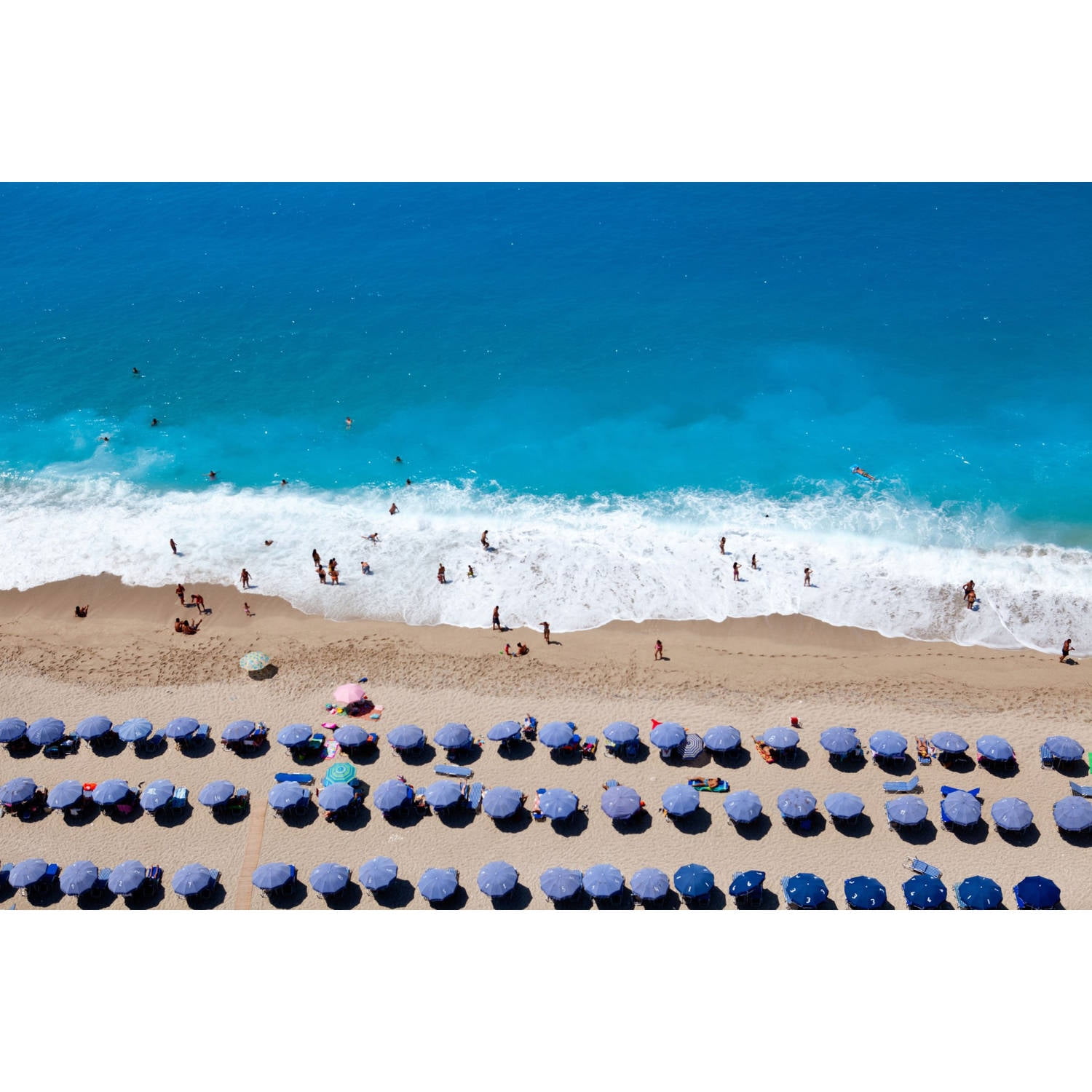 Marmont Hill Blue Umbrella Rows Photographic Print on Wrapped Canvas