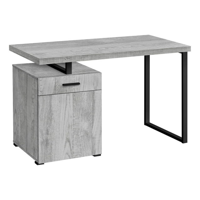 Contemporary 48-inch computer desk featuring a grey wood laminate surface, left-side storage drawers, and black metal legs for home office use.