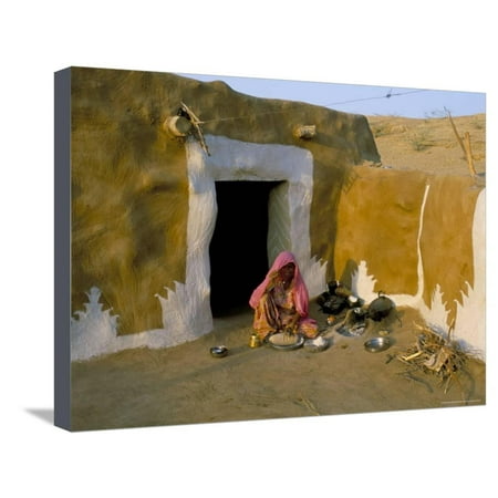 Woman Cooking Outside House with Painted Walls, Village Near Jaisalmer, Rajasthan State, India Stretched Canvas Print Wall Art By Bruno (Best Way To Paint Outside Of House)
