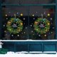 thumbnail image 3 of Pegatinas para ventana con corona navideña, 2 hojas, guirnalda navideña verde con frutas, copos de nieve, adhesivos para ventanas, pegatinas navideñas para puerta y nevera para decoración del hog, 3 of 5