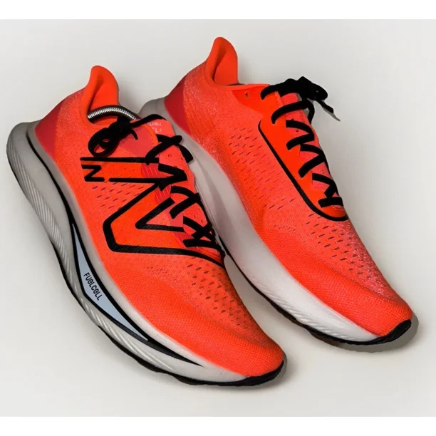 Brand New: Men's Size 12 New Balance FuelCell Rebel v3 Orange MFCXCD3 Running