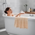 thumbnail image 4 of Toalla de baño de algodón de primera calidad 140x70cm Suave absorbente Secado rápido Seda dorada Toallita de algodón roto para casa Baño Spa Gimnasio Viajes Tamaño adulto Lujo Comodidad 300g Peso, 4 of 5