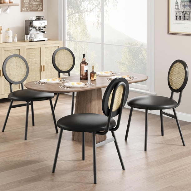 Set of 4 negra metal dining sillas featuring hand-woven rattan backrest y faux leather seat