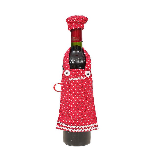 Decoración festiva de la cena de la fiesta de tapas de champán de vino con delantal navideño