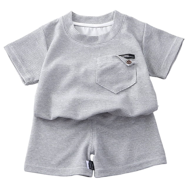 felwors Garçons Filles Ensembles de Vêtements Unis T-Shirt à Manches Courtes Col Ras du Cou et Ensemble de Shorts Tenues Décontractées d'Été avec Poche pour Enfants (Gris, 4-5 Ans)