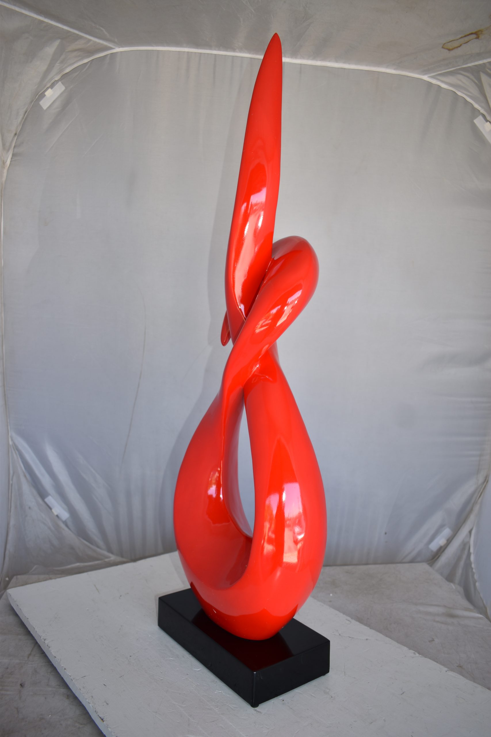 Modern Art Red Eternity Sculpture Made of Resin on A Base Size: 13" x 7" x 42"H