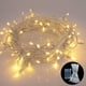 thumbnail image 1 of Guirnalda de luces LED de 10 m y 100 ledes que funciona con pilas para decoración de interiores, exteriores, bodas, fiestas y jardines, color blanco cálido, 1 of 7