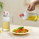 thumbnail image 5 of Botella dispensadora de aceite de 630 ml | Recipiente de vidrio hermético para aceite de oliva con asa antideslizante | Tapa abatible automática con pico vertedor antigoteo | Botella para aceite,, 5 of 6