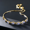 thumbnail image 4 of Gem Stone King 18K Yellow Gold Plated Silver Blue Tanzanite Tennis Bracelet for Women (2.66 Cttw, Round 4.5MM, Gemstone Birthstone, Fully Adjustable up to 9 inch), 4 of 5