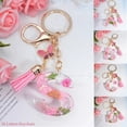 thumbnail image 2 of Llaveros con iniciales de flores secas de A-Z para mujer, colgante de borla de mariposa, adornos para bolsos, llavero de coche, regalos de recuerdo, 2 of 4