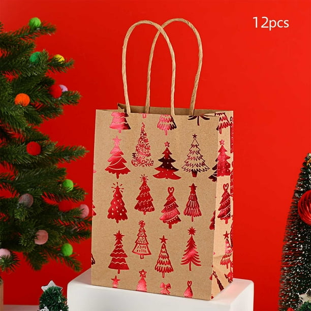 Bolsa de tela navideña con copos de nieve | Bolsas de regalo de papel kraft con diseño de árbol de Navidad | Embalaje para fiestas navideñas de fondo plano | Papel rojo
