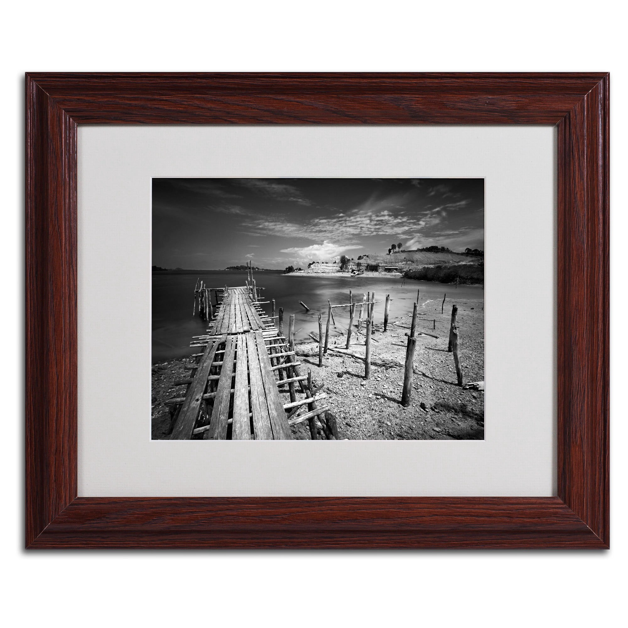 Matted art under acrylic in a black frame