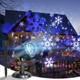 thumbnail image 1 of Proyector de luces navideñas con diseño de copos de nieve para exteriores, 1 of 1