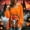 Orange, variant on Women's Halloween Witch Broom Graphic Long Sleeve Crew Neck Top Loose Fit Irregular Hem for Ugly Sweater Contest Party Black M