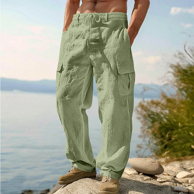 Pantalones largos de poliéster para hombre, de moda, de color liso, con múltiples bolsillos, con cordón y estilo informal.